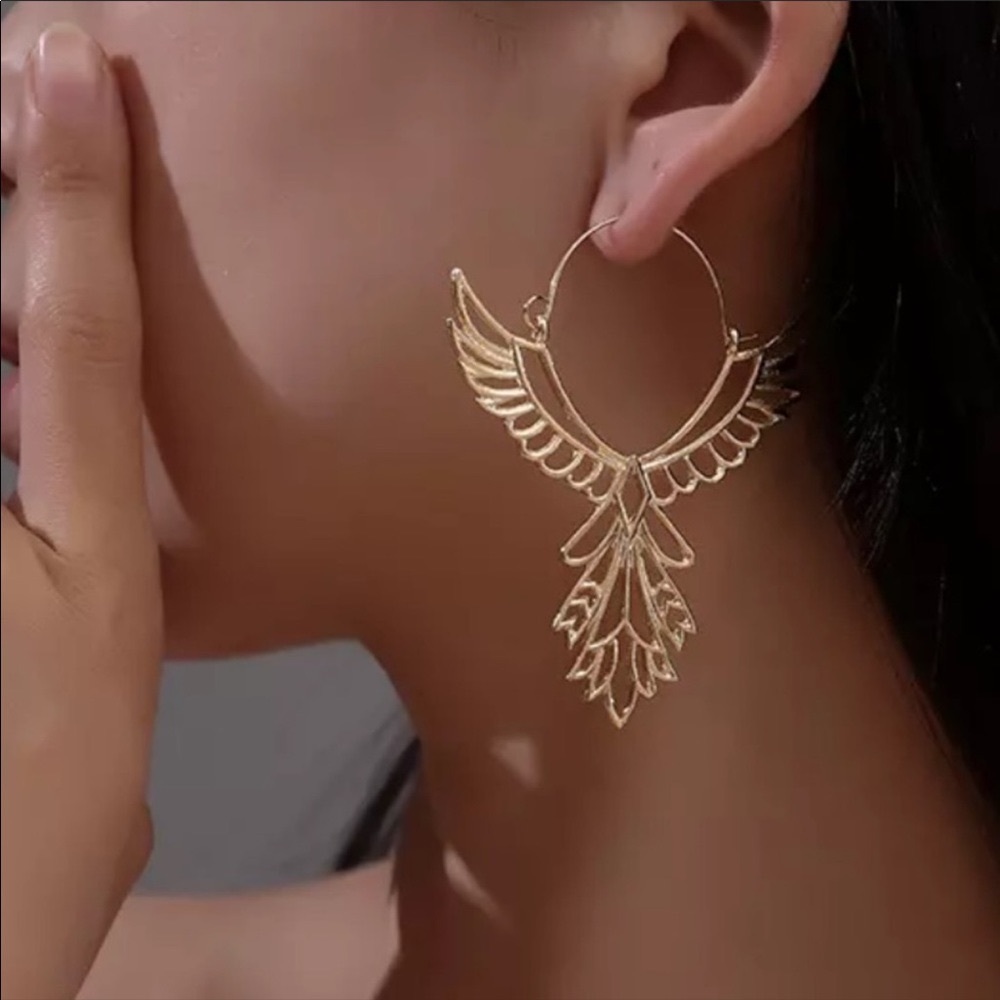 *** SOLD *** Free people freebird earrings in rose gold